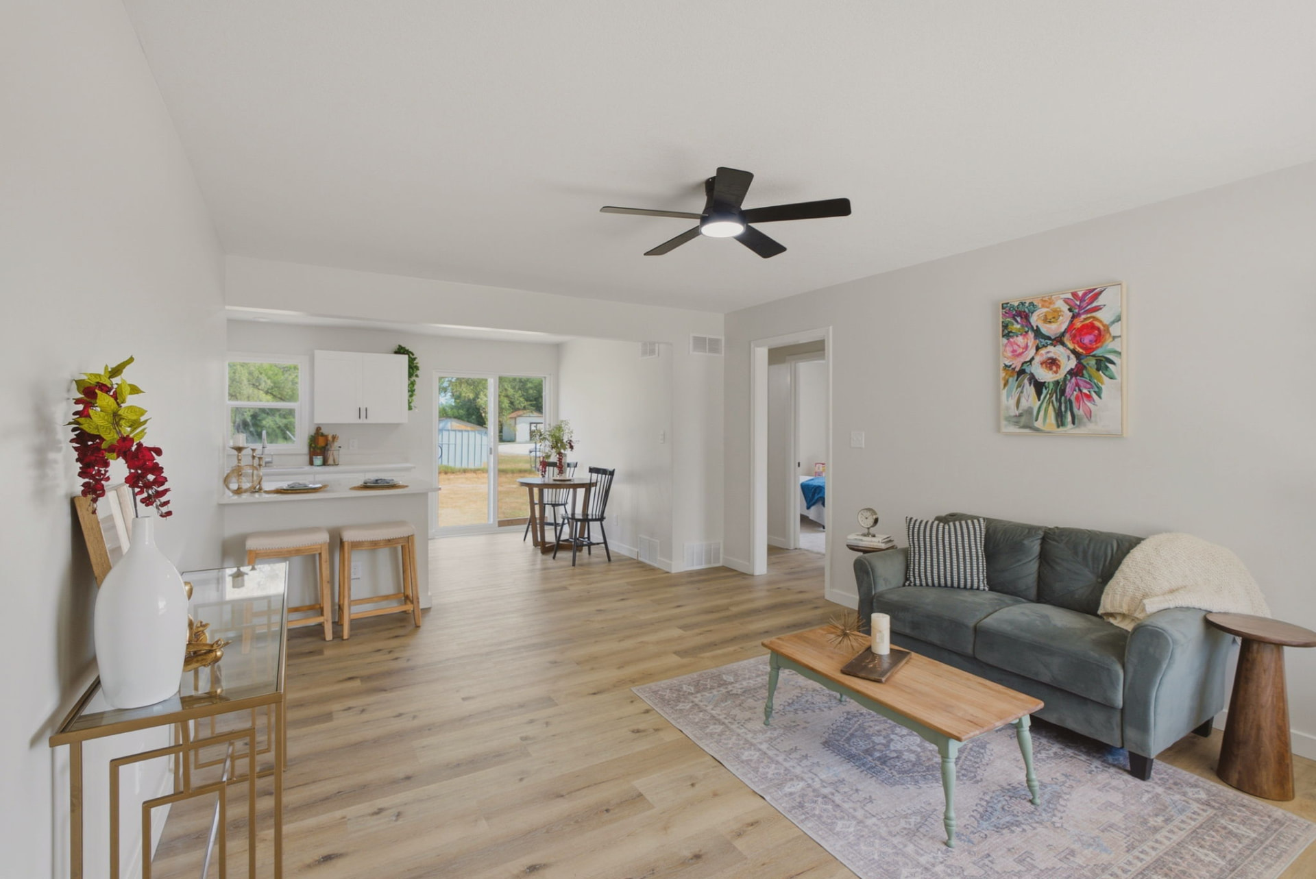 Open living room and kitchen of the renovated Georgia House
