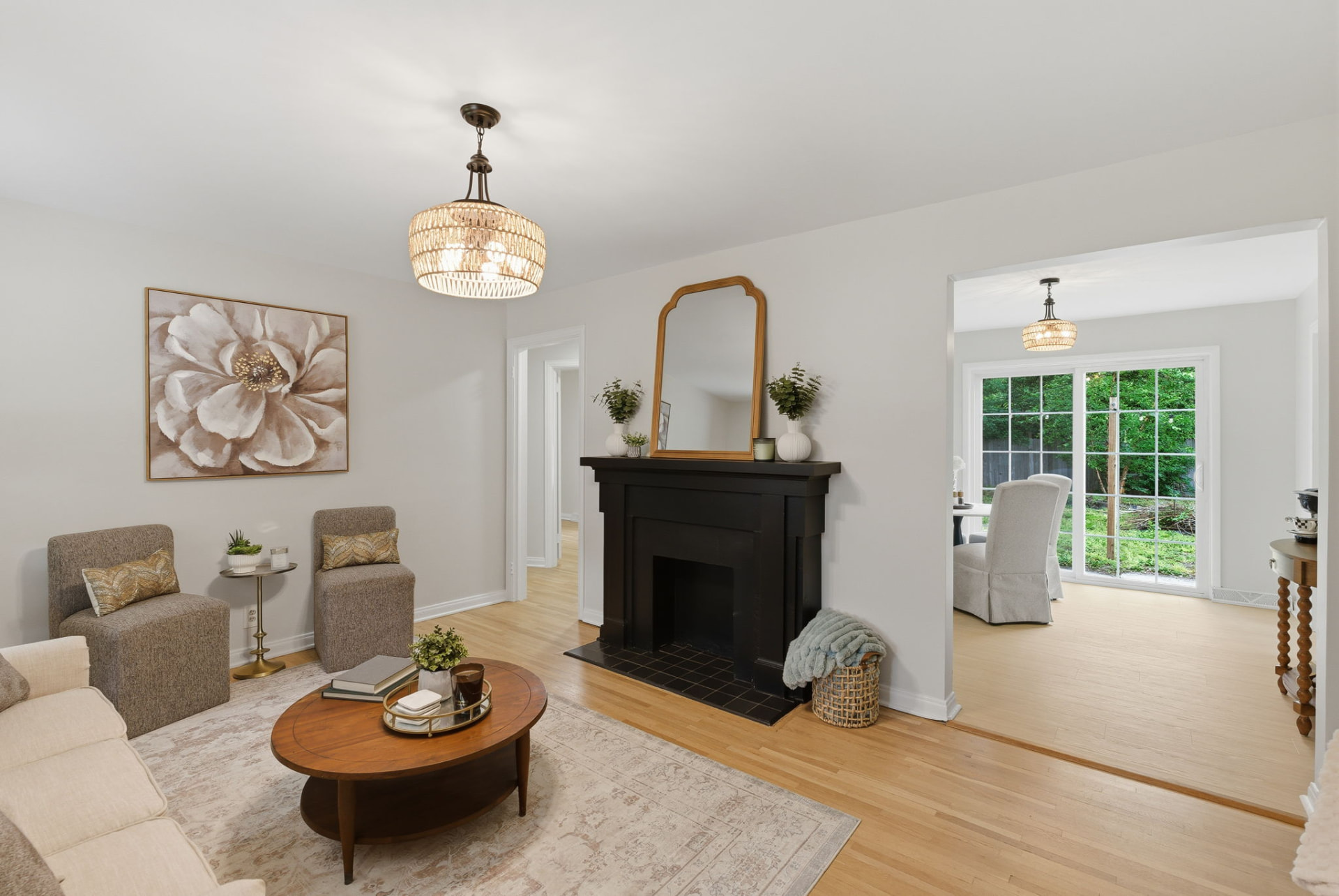 Renovated Riverside House living room with fireplace and adjoining dining room