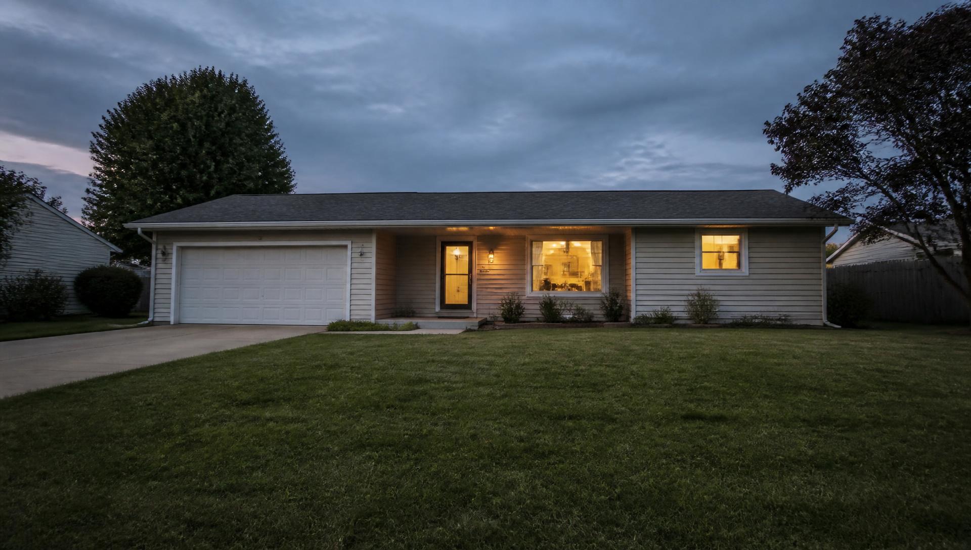 Single-story Wichita home at dusk